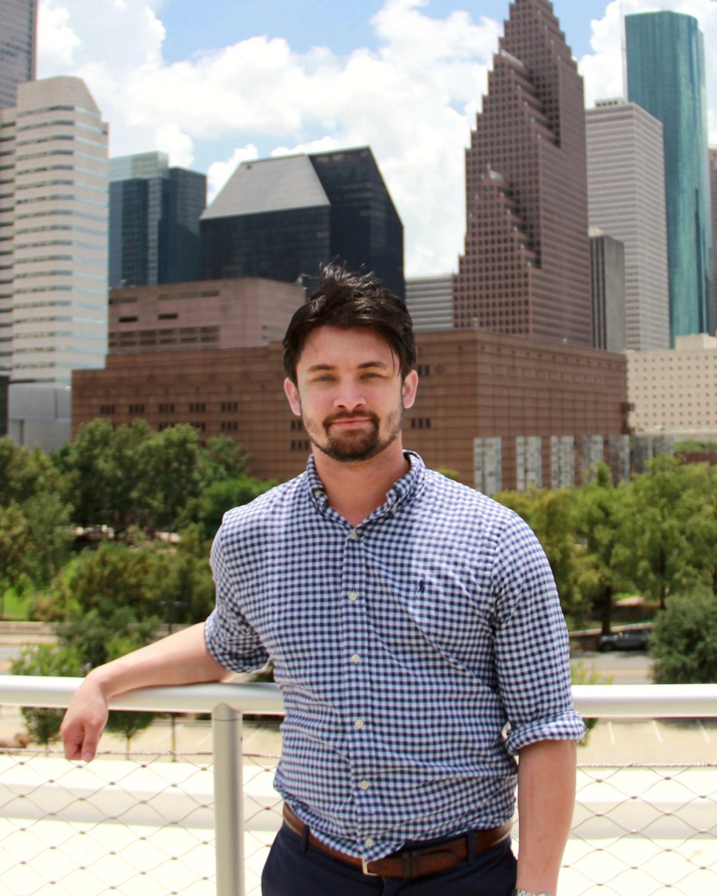 James Araya in front of the downtown Houston skyline